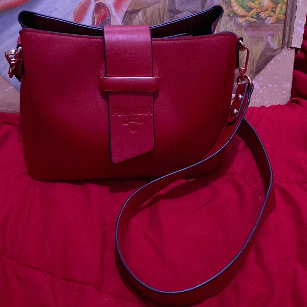 Prada red bag 3in long 3in deep